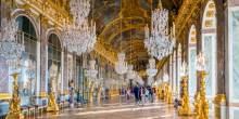Immersed in the grandeur of the Hall of Mirrors at Versailles Palace